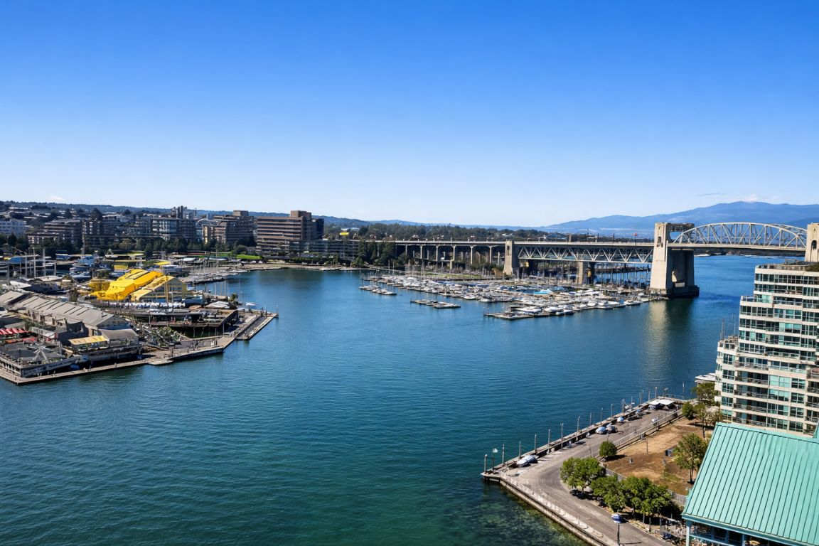 Scenic view of Granville Island harbor and Vancouver waterfront skyline experienced with Vancouver Canada Tours